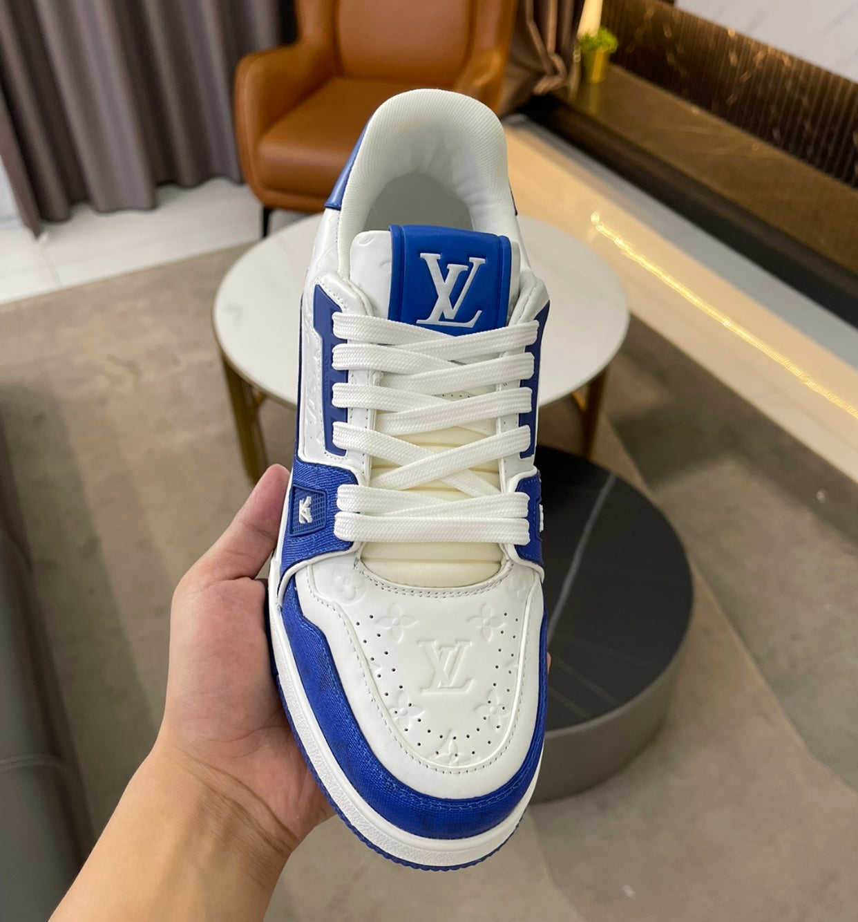 red lv trainer sneaker