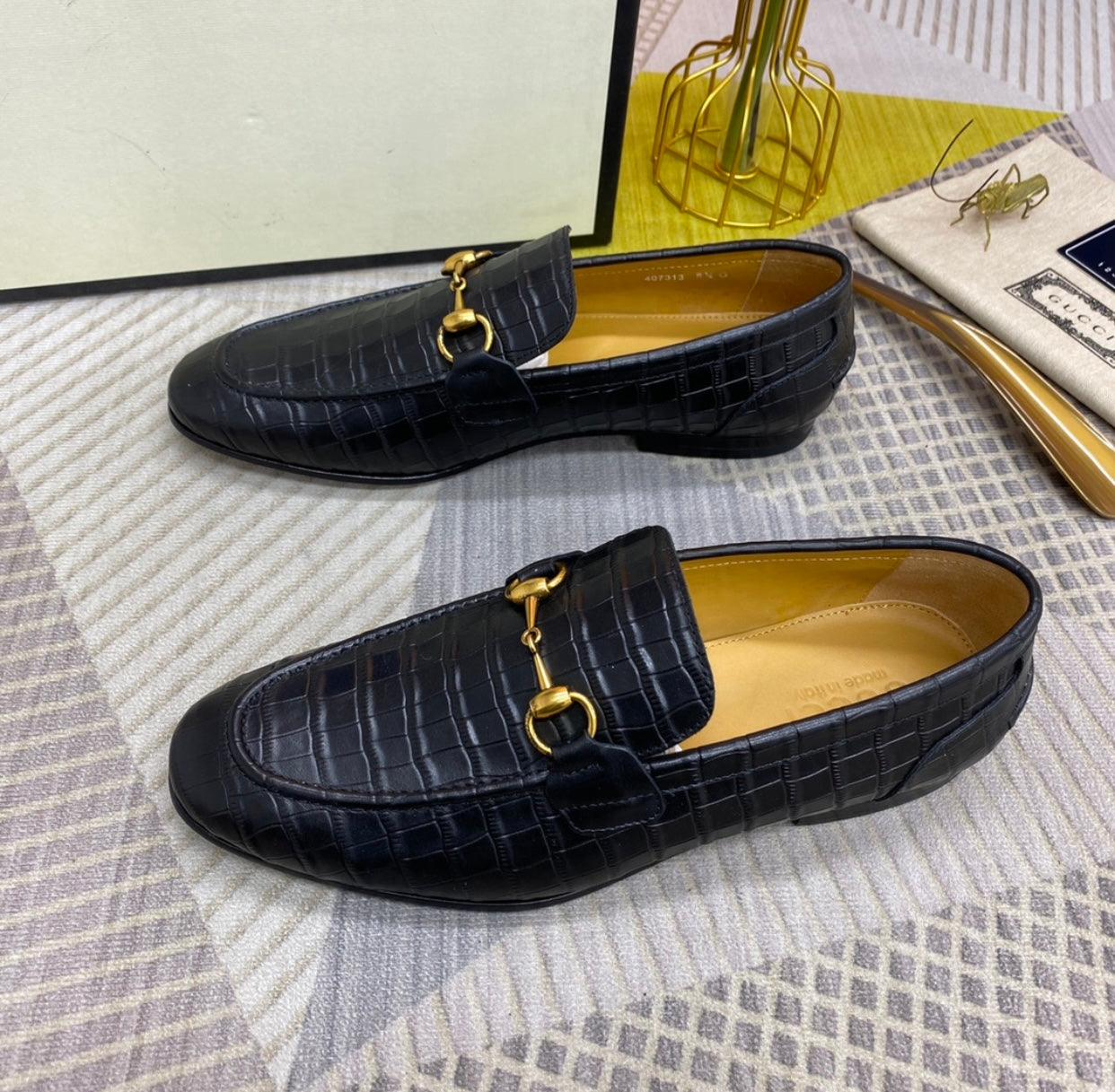 GG Embossed Loafers