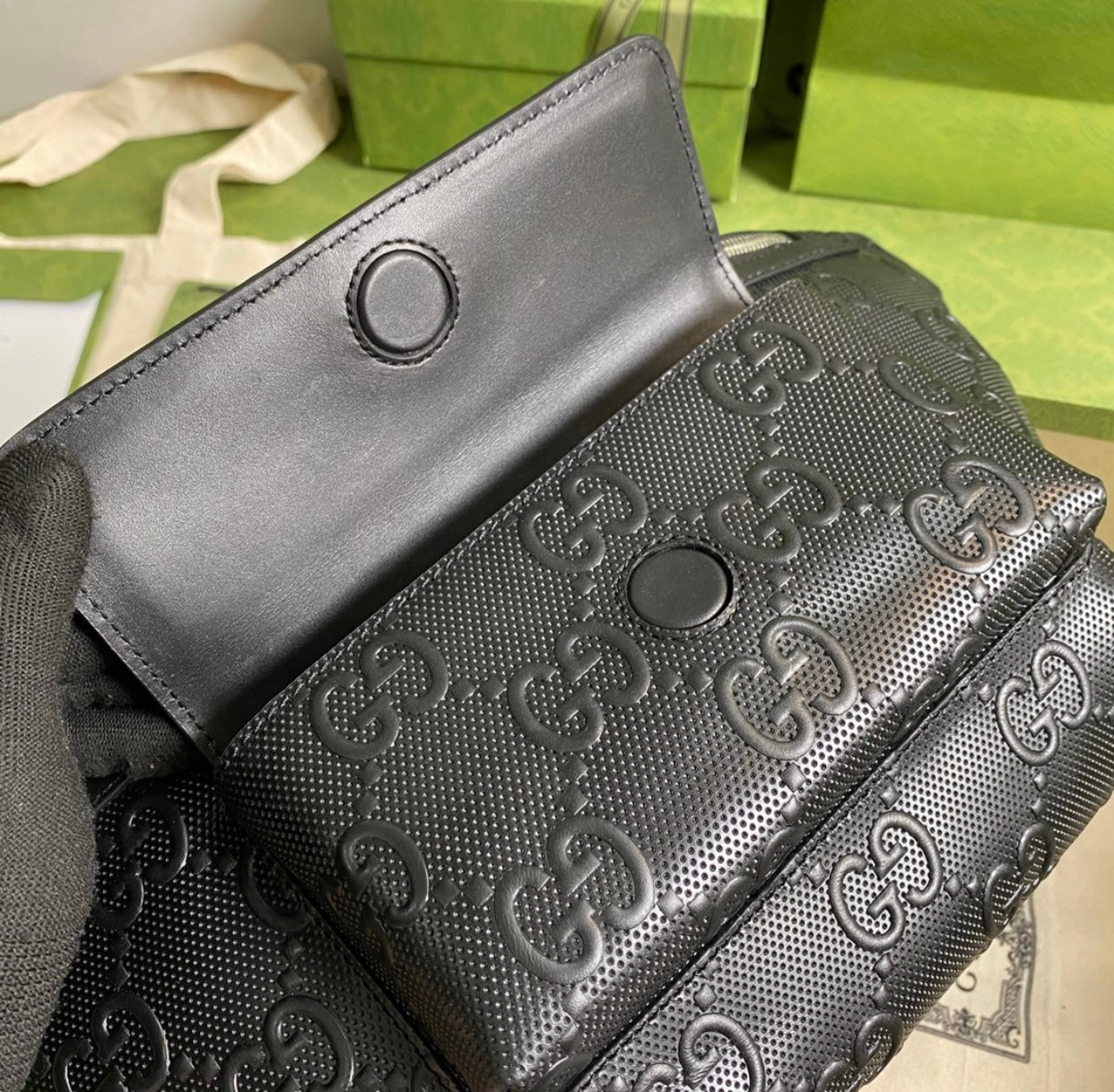 Gucci GG embossed belt bag