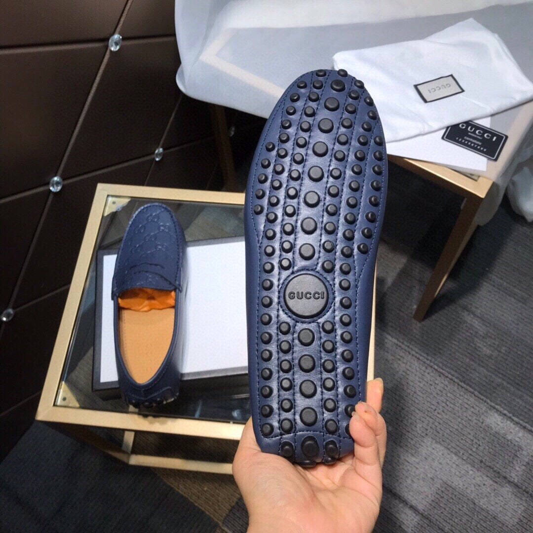 GG Embossed Loafers