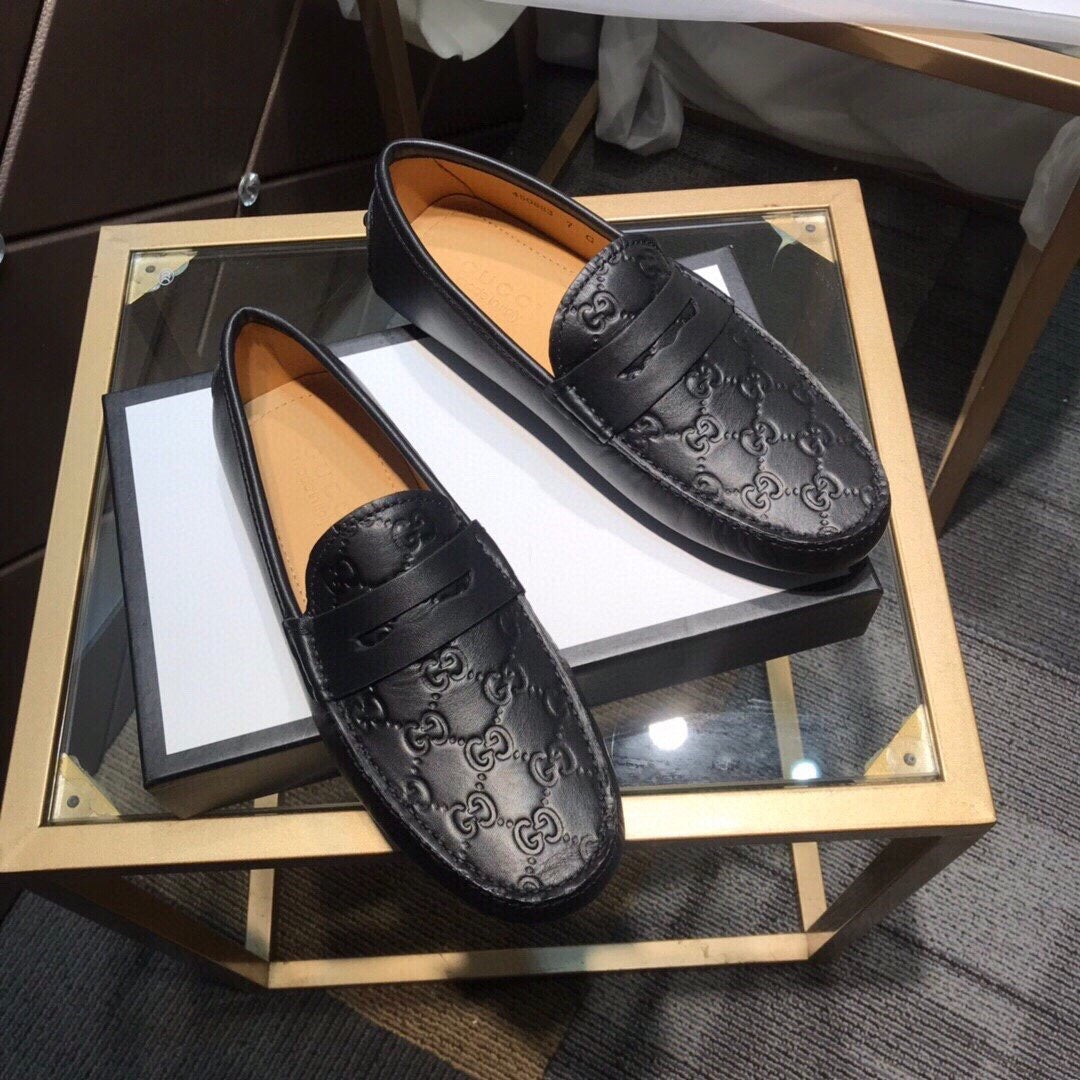 GG Embossed Loafers