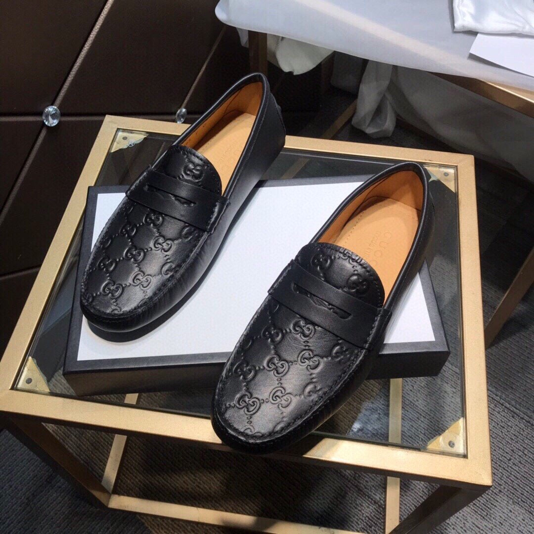 GG Embossed Loafers