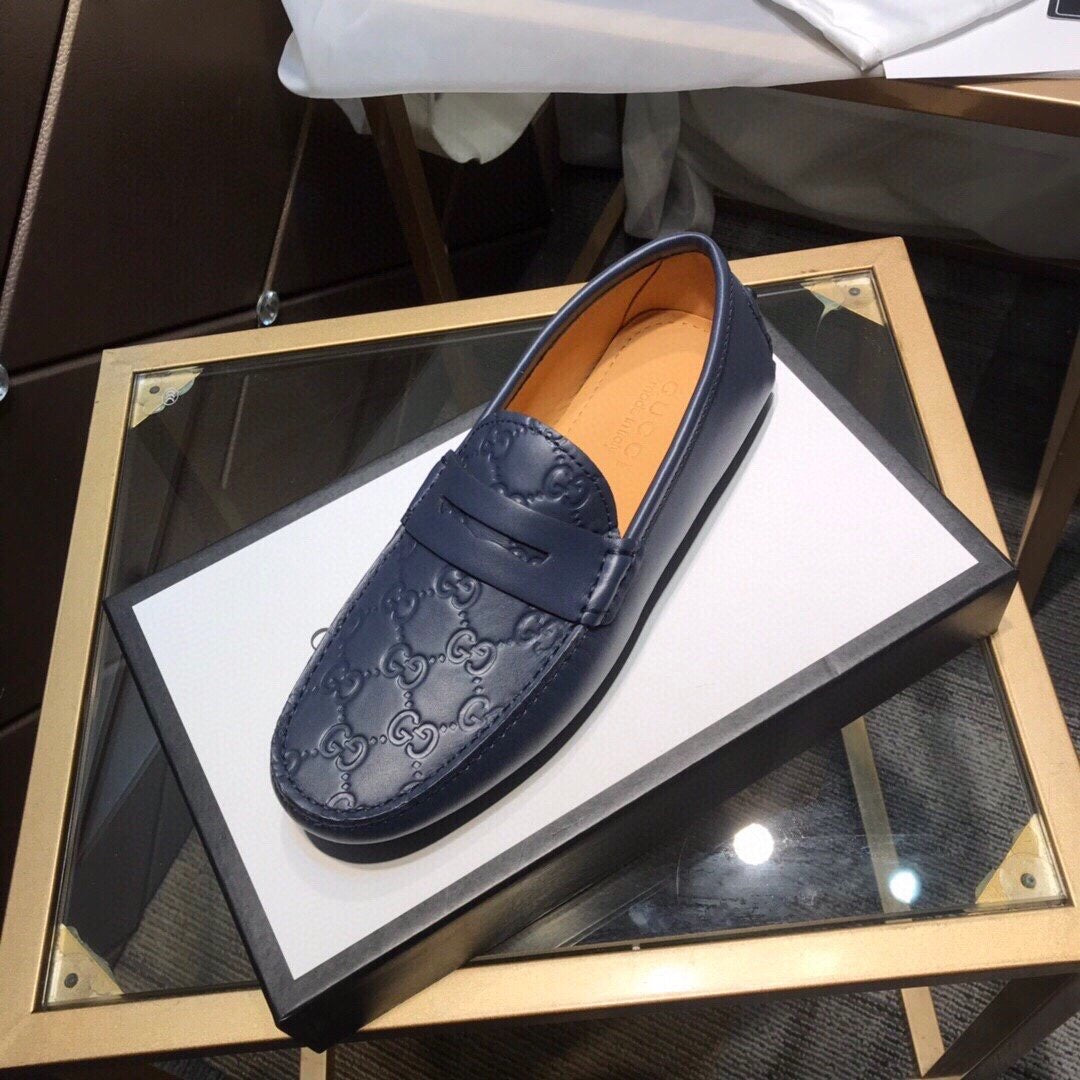 GG Embossed Loafers